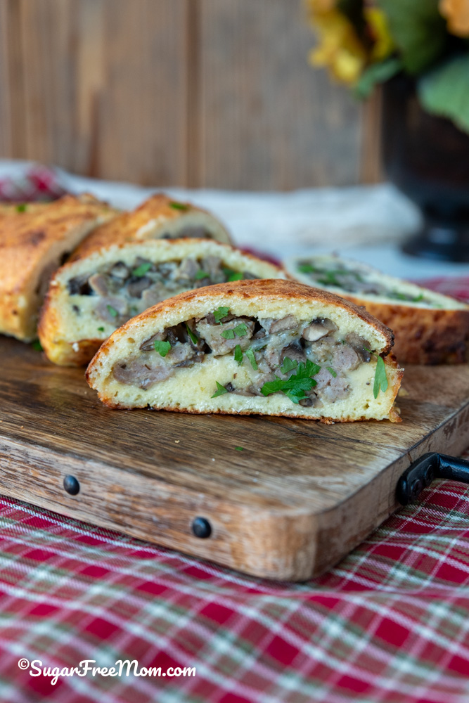 This amazing keto fathead dough is almond flour free and makes the best low carb calzone that's stuffed with breakfast sausage cheese and egg! 