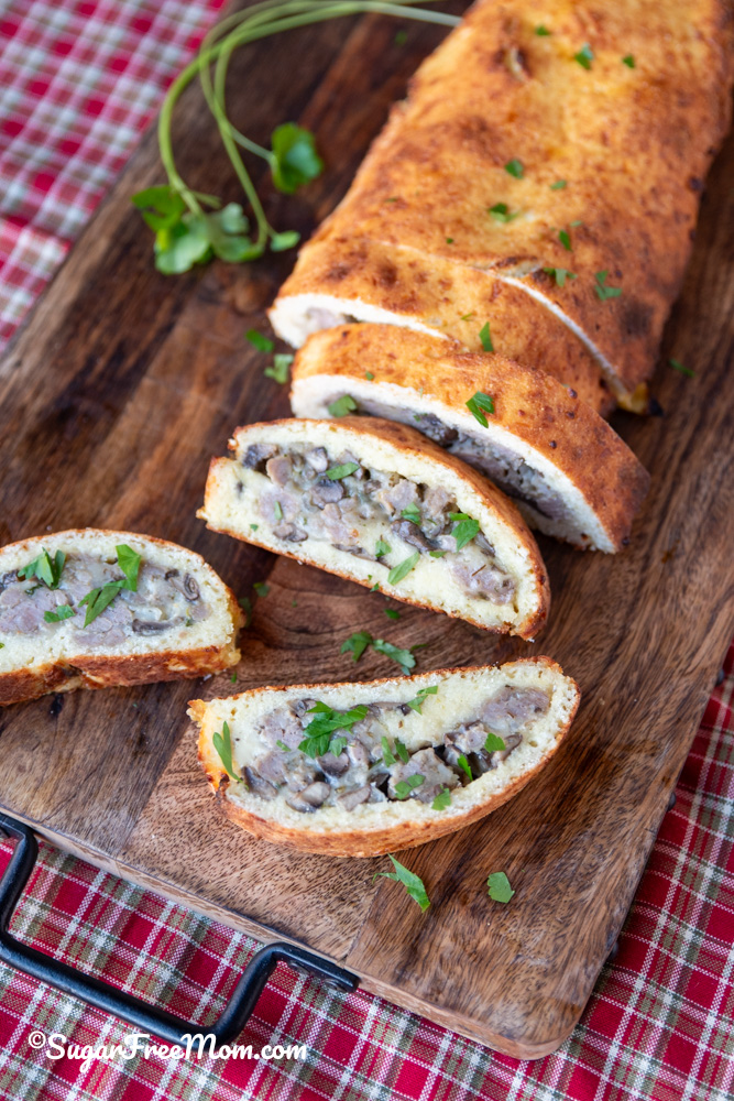 This amazing keto fathead dough is almond flour free and makes the best low carb calzone that's stuffed with breakfast sausage cheese and egg! 