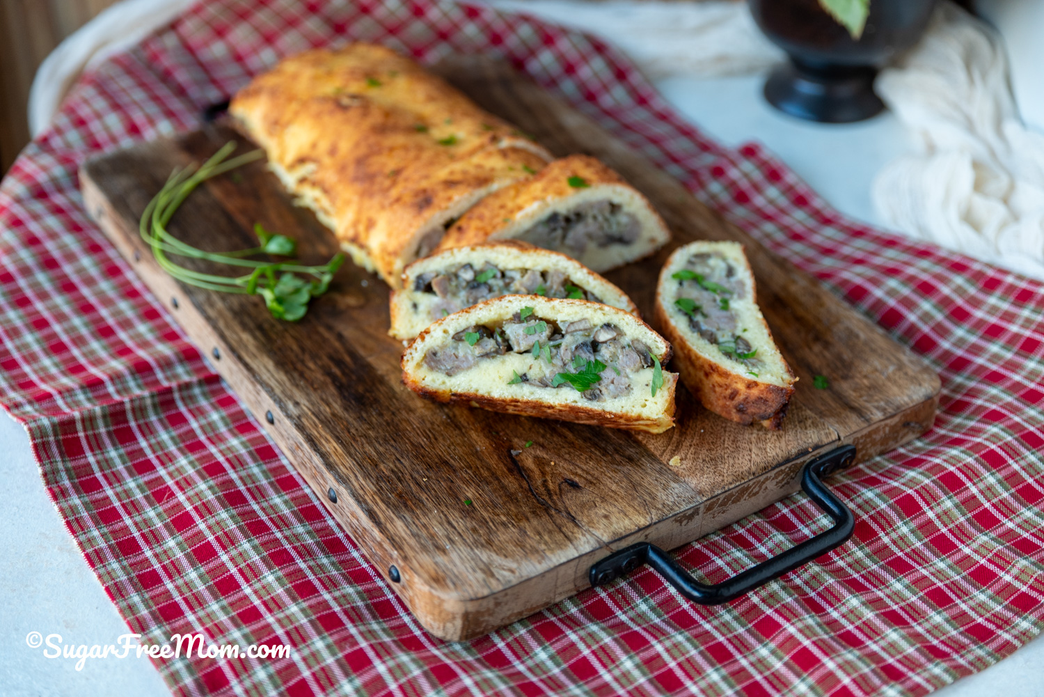 This amazing keto fathead dough is almond flour free and makes the best low carb calzone that's stuffed with breakfast sausage cheese and egg! 