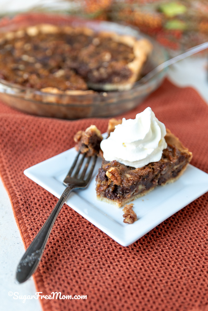 This easy keto Kentucky derby pie has a delicious gooey chocolate pecan filling baked in a flaky easy keto pie crust. Just 4 g net carbs per serving! 