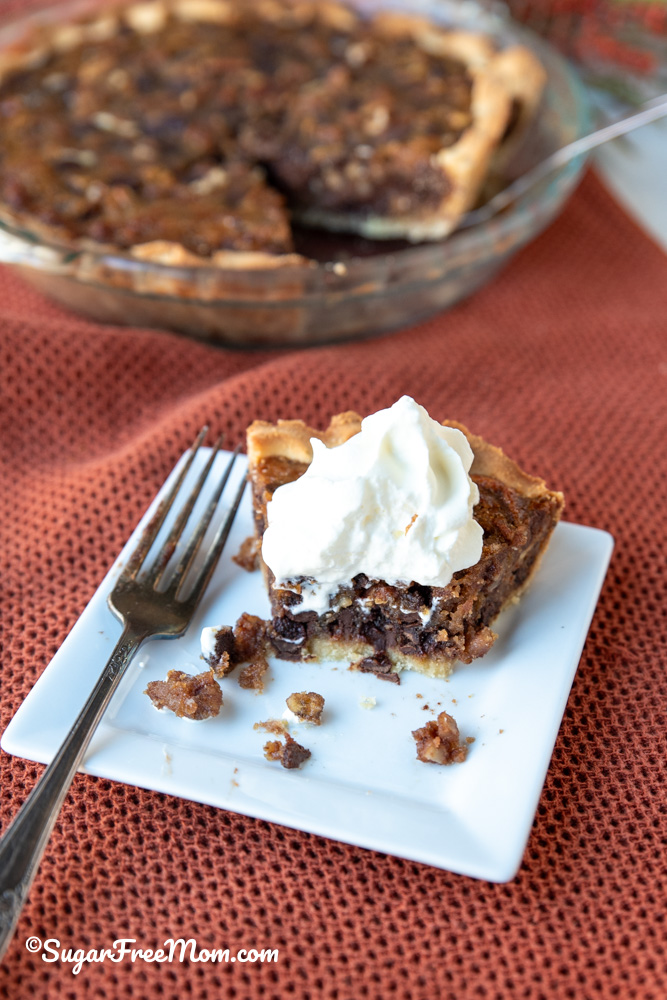 This easy keto Kentucky derby pie has a delicious gooey chocolate pecan filling baked in a flaky easy keto pie crust. 